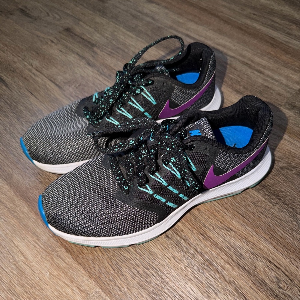 Nike Women's Gray Athletic Shoes with Purple Swoosh and Teal Accents